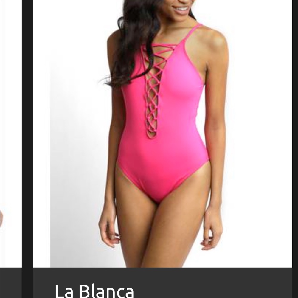 La Blanca island goddess lace up pink one piece swim suit.